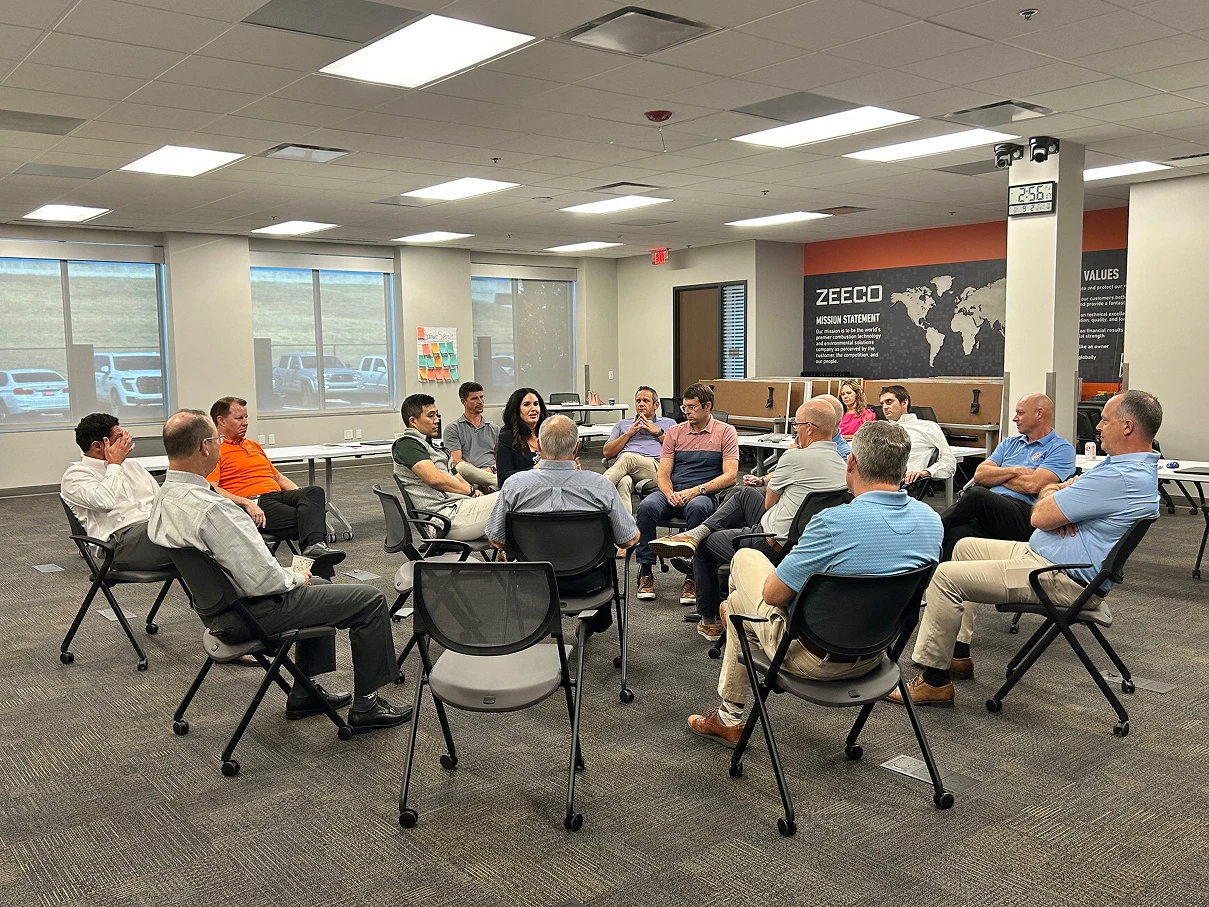 Group-sitting-in-circle-at-Zeeco-corporate-training